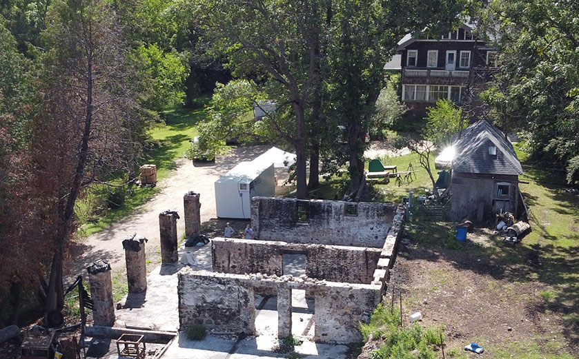 The remaining stone foundation and pillars of the Apple Barn after the fire
